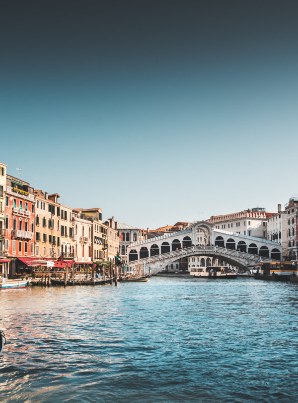 The Rialto Bridge spans across the grand canal.