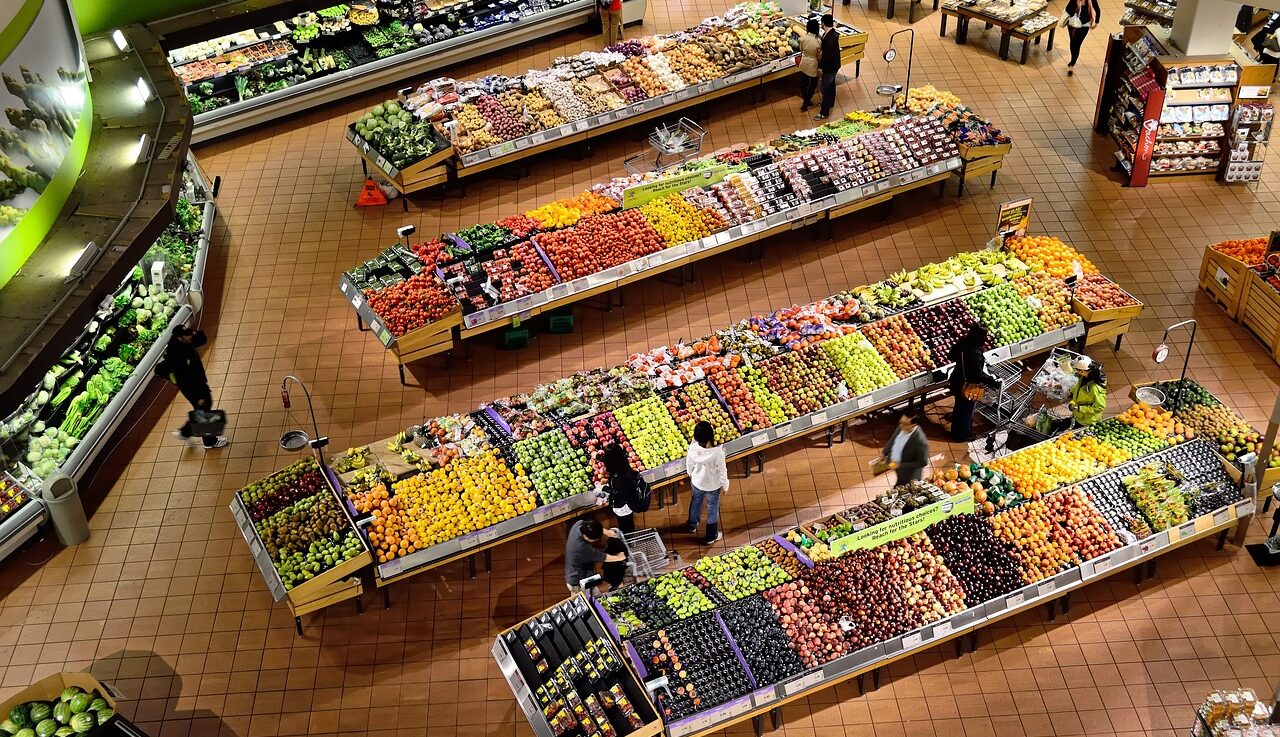 Rows of produce in shopping aisles