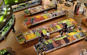 Rows of produce in shopping aisles