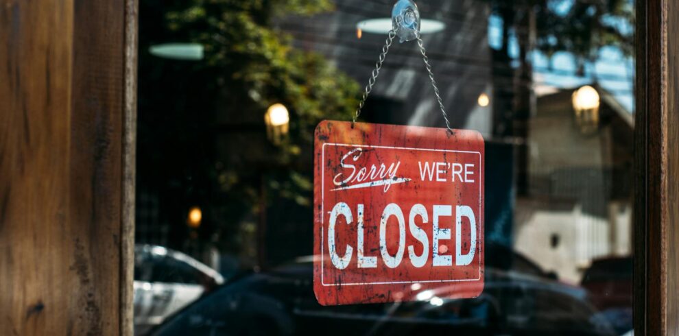"sorry, we're closed" sign