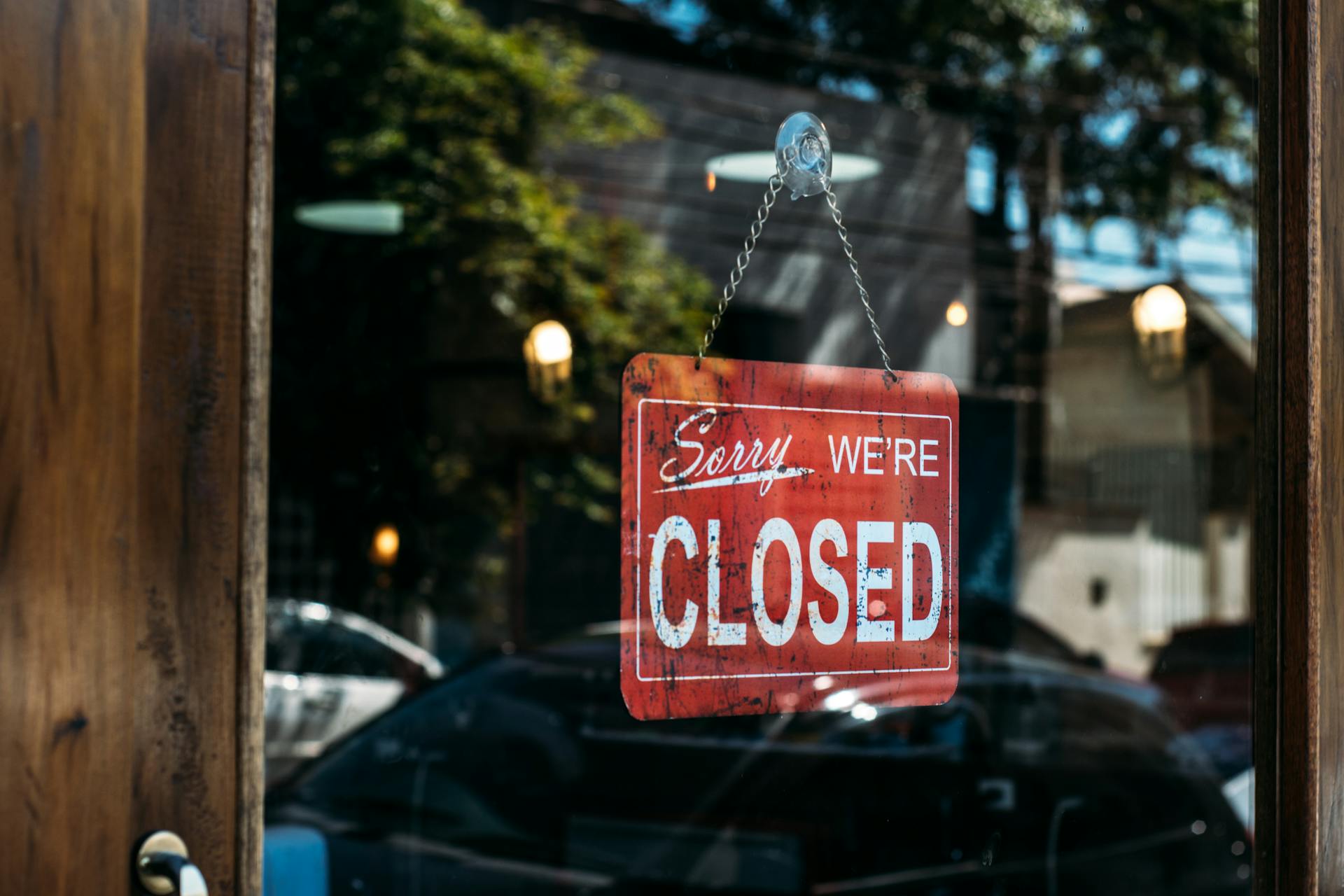 "sorry, we're closed" sign