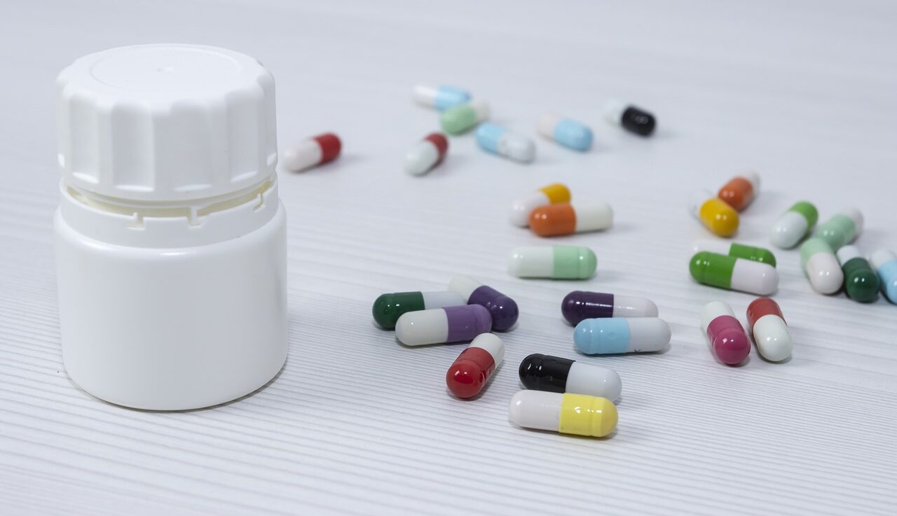 pill bottle with multi-colored pills