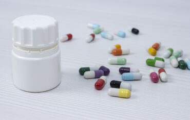 pill bottle with multi-colored pills